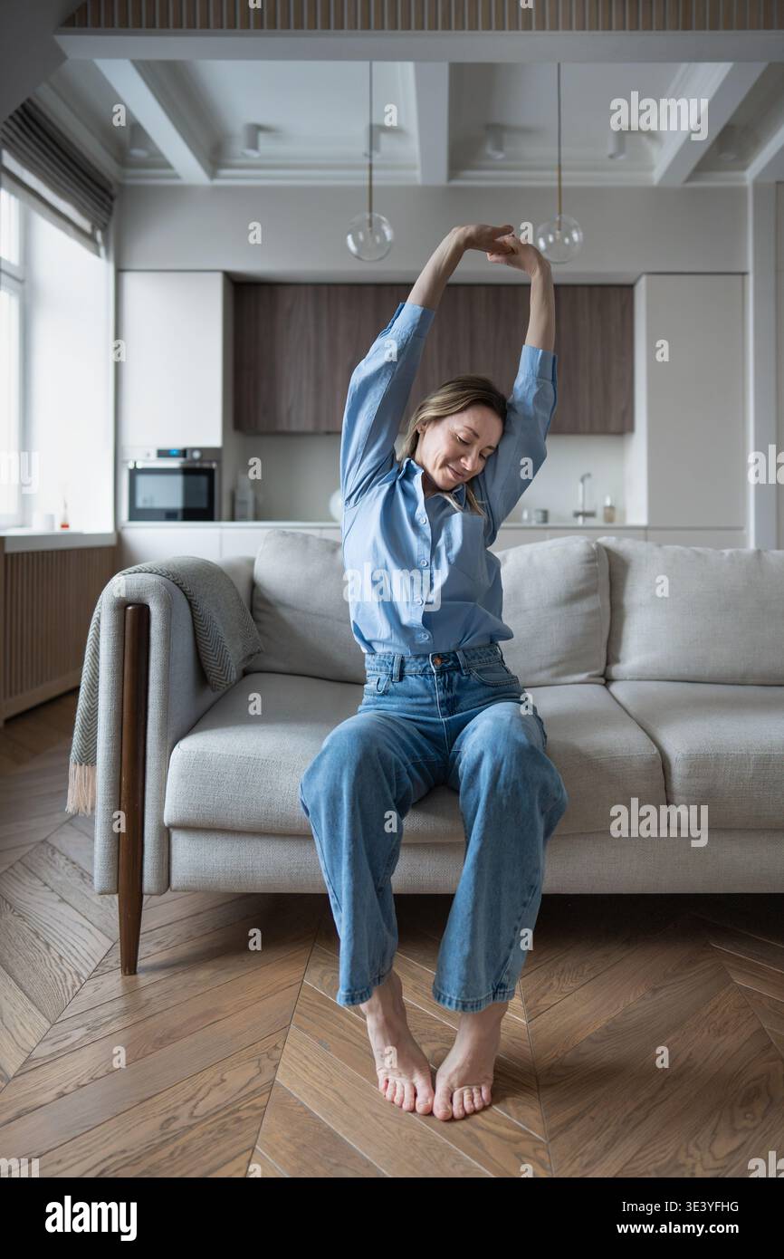 Woman barefoot in jeans hi-res stock photography and images - Alamy