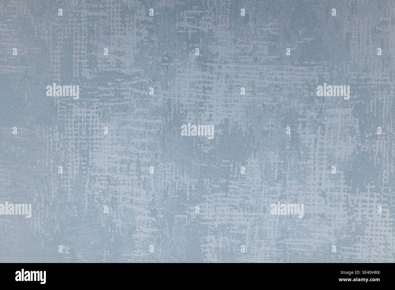 Light blue textured wallpaper background with distressed pattern Stock Photo