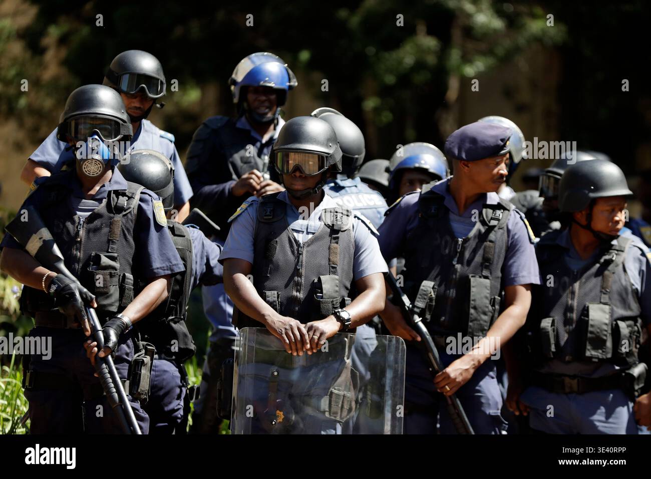 Police Rpp FILE -South African riot police stand outside the great hall at the ...