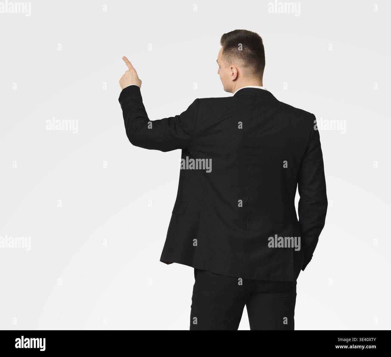 Businessman in suit working with digital virtual screen Stock Photo