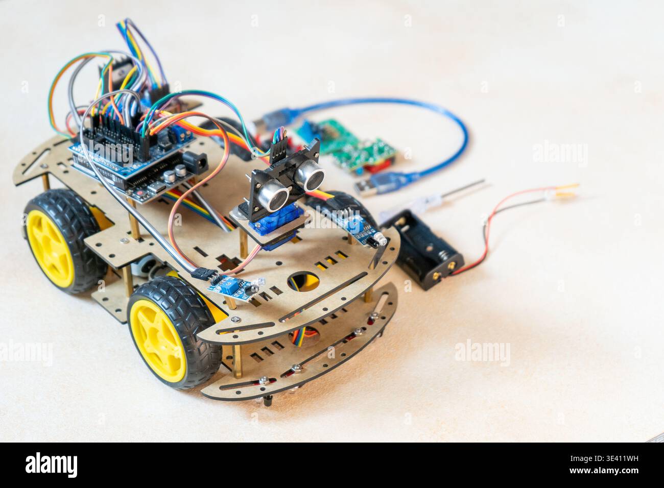 DIY Robot Car Assembly and Components. Educational electronics project for STEM learning and robotics. Stock Photo
