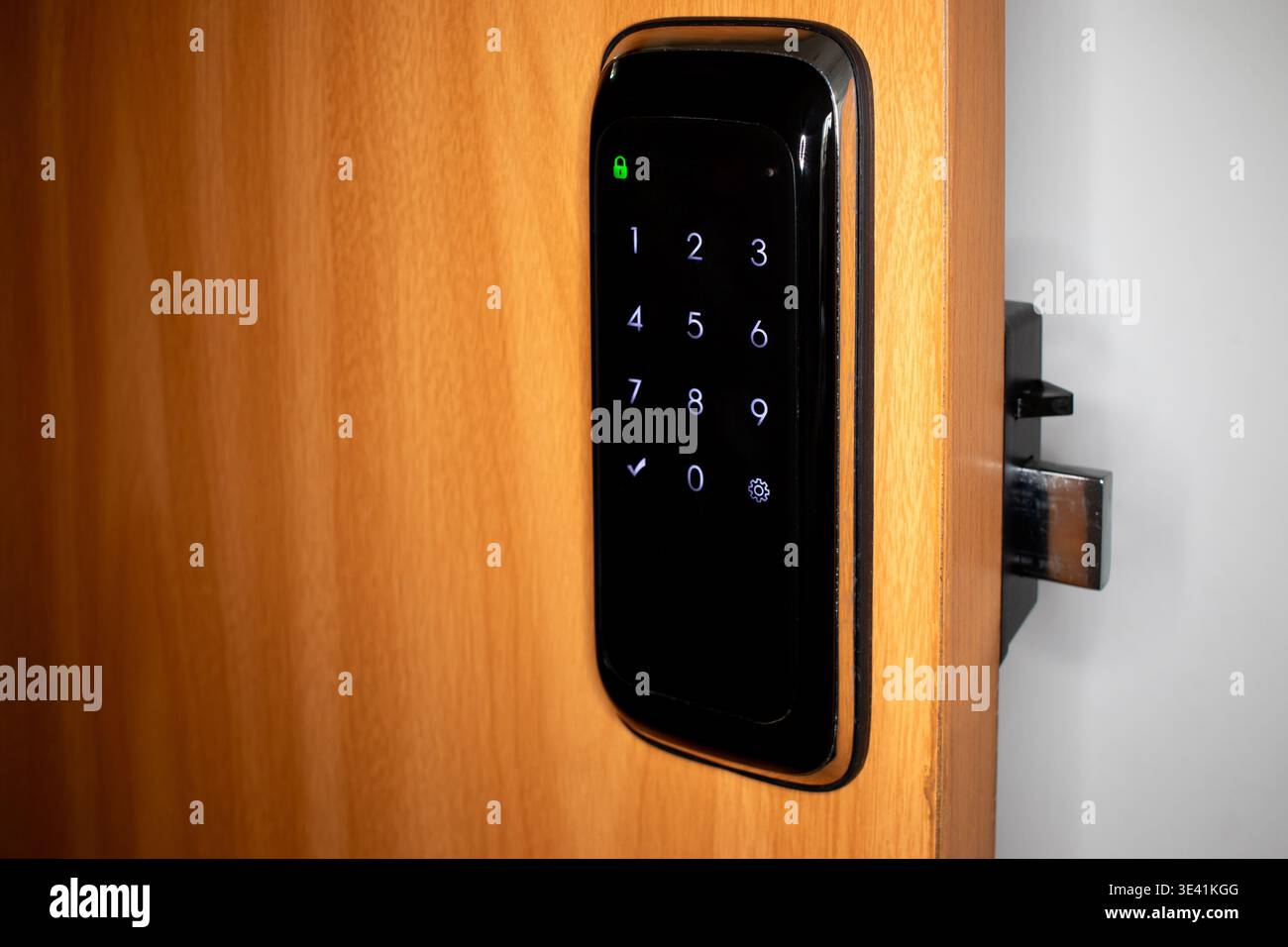 Electronic numerical lock installed on the door. Stock Photo