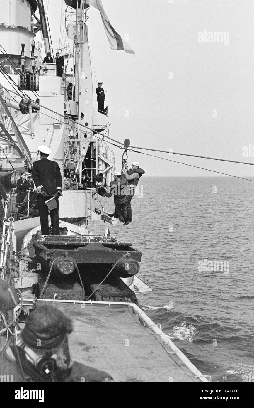 US navy sailors arriving on board Royal Navy aircraft carrier HMS Glory ...