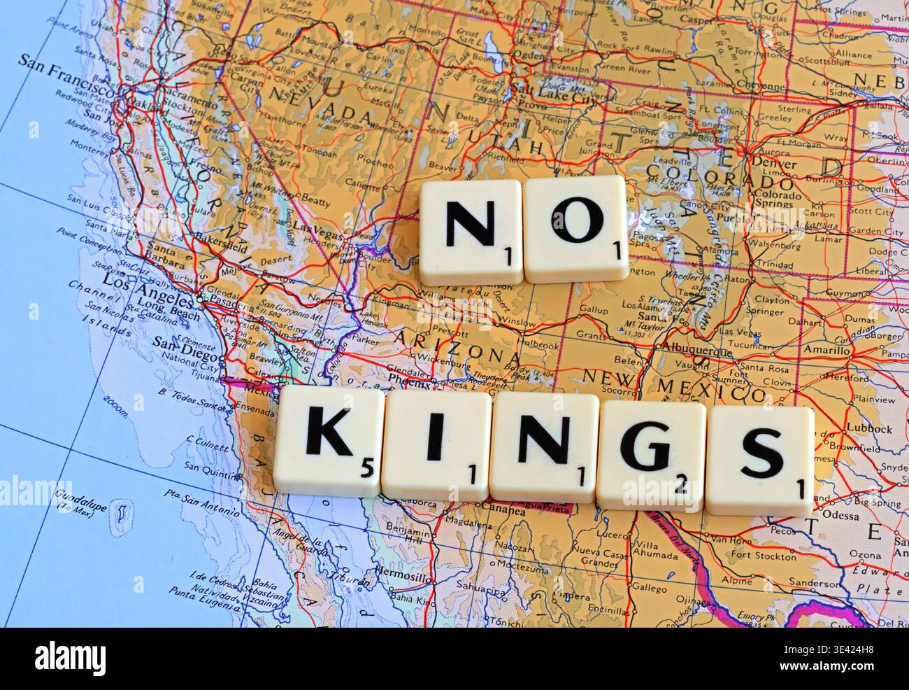 #NoKings No Kings anti-Trump marches and demonstrations - Los Angeles, San Francisco, Nevada, Arizona, Salt Lake City on map with Scrabble Letters Stock Photo