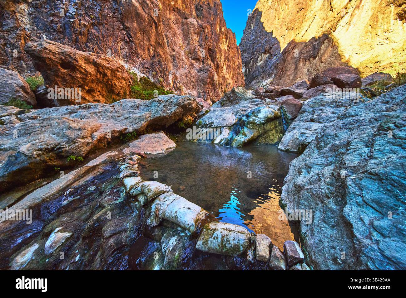 Goldstrike Hot Spring Pool Among Rugged Canyon Walls Nevada Geothermal Landscape Stock Photo