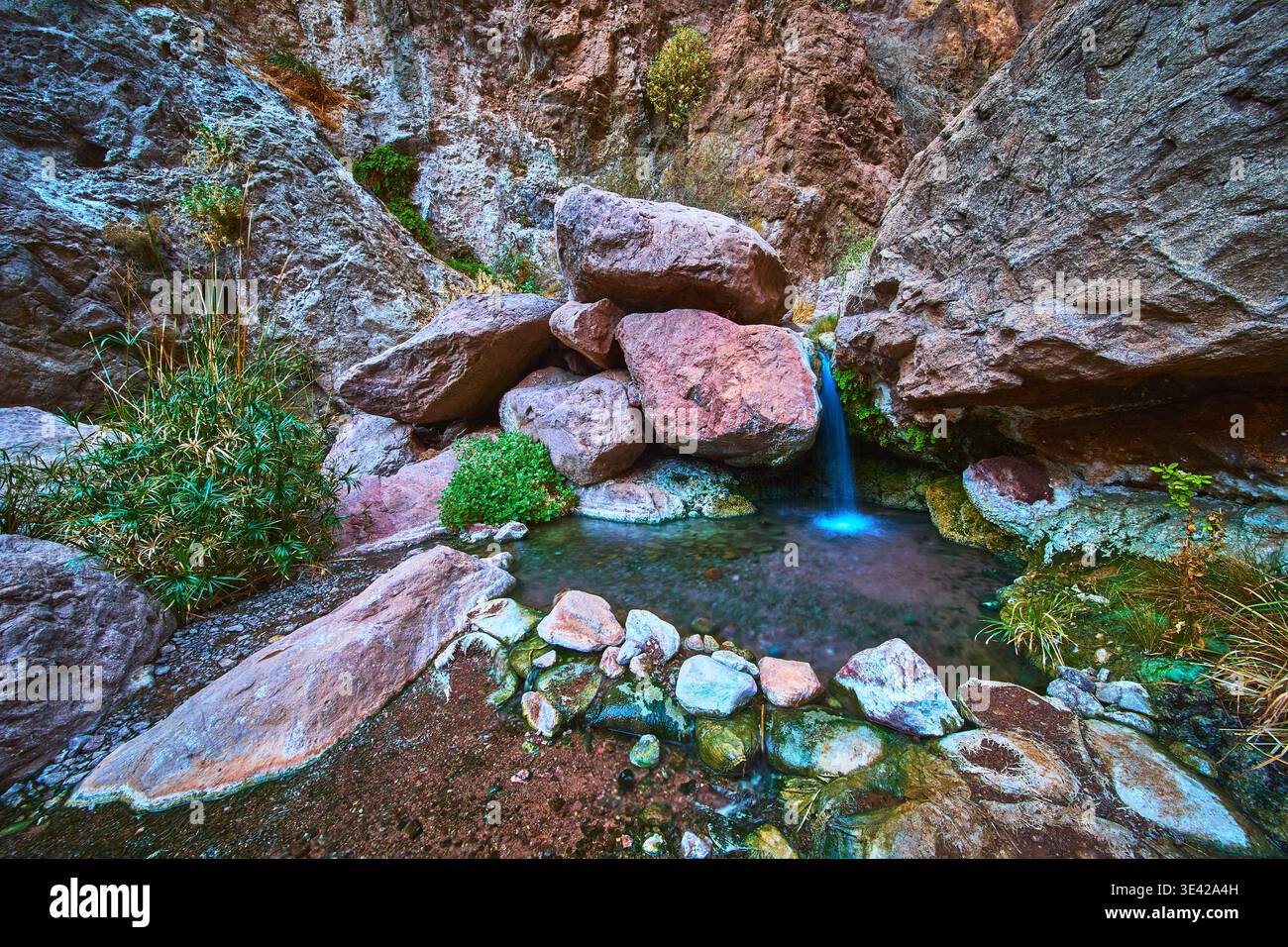 Goldstrike Hot Spring Geothermal Waterfall and Rocky Desert Oasis Nevada Stock Photo