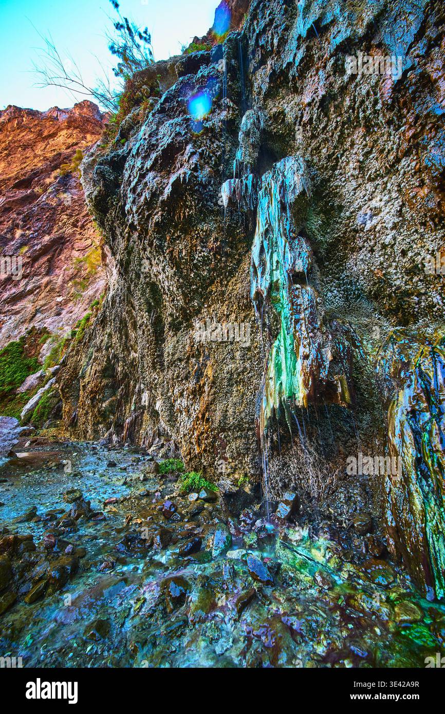 Cliffside Spring Geothermal Cliffside with Flowing Water and Mineral Deposits at ...