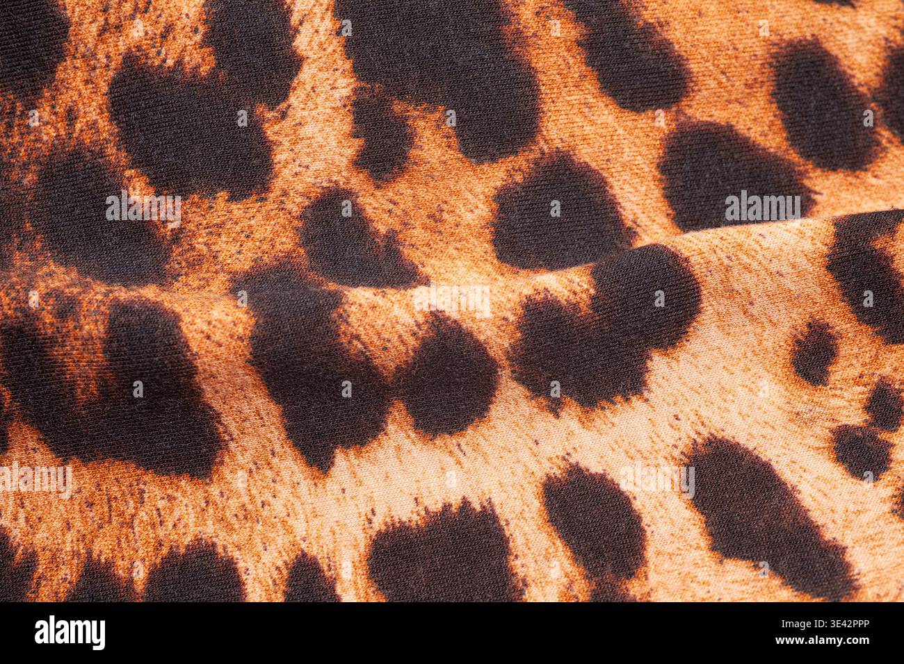 Leopard print fabric texture background close up Stock Photo