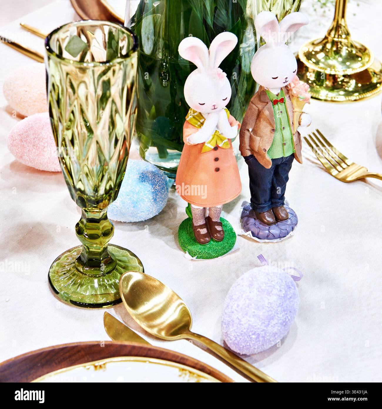 Easter eggs and bunnies on the dining table Stock Photo