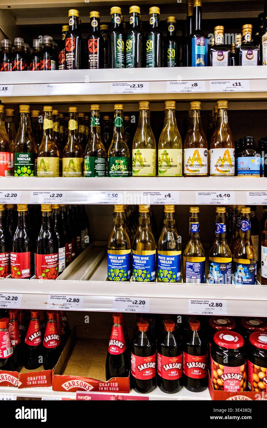 London UK March 25 2026, Supermarket Display Of a Selection of Vinegar Used as Cooking Ingredients Stock Photo