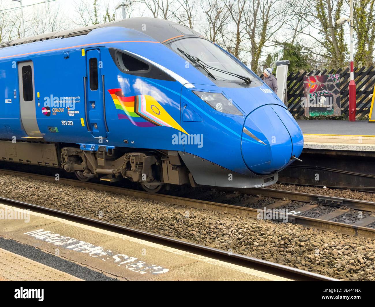 A blue Lumo train Class 803 unit 803003 arriving at Morpeth station platform UK  East Coast Main Line - Smartphone Captured Stock Image