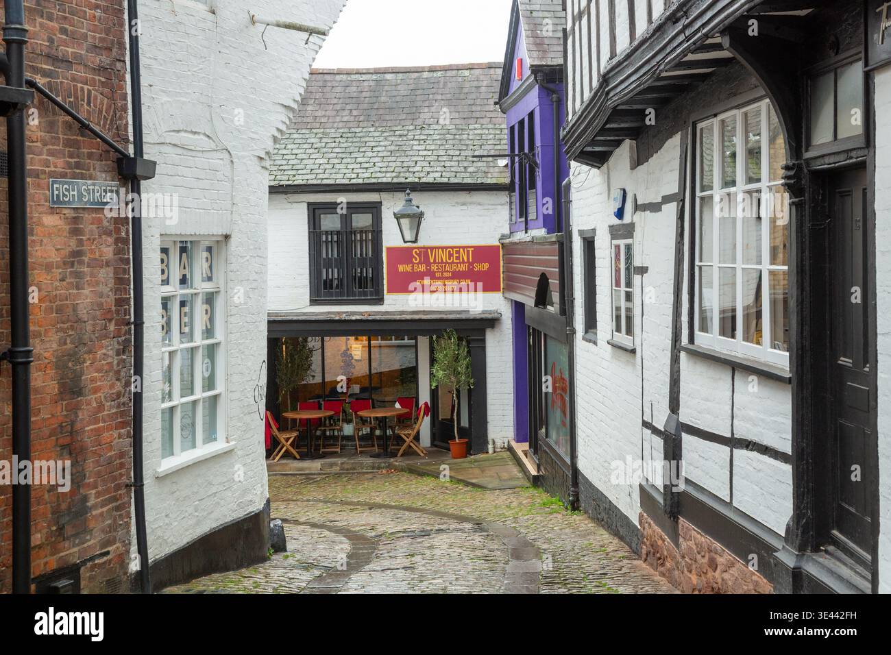The narrow, cobbled alleyway known as Fish Street in the historic ...