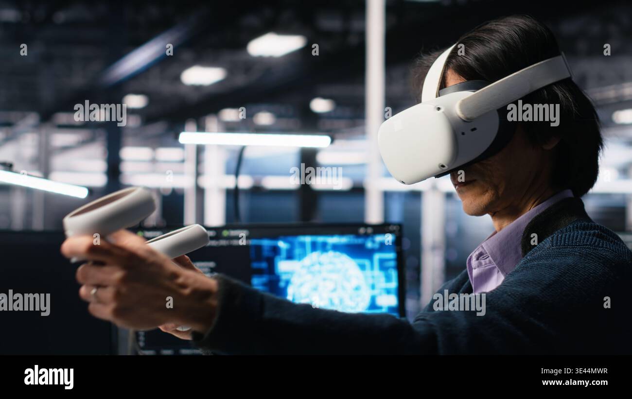 Data center engineer using virtual reality, working on neural network software development. IT expert in server room using VR equipment, implementing machine learning technology, camera A Stock Photo