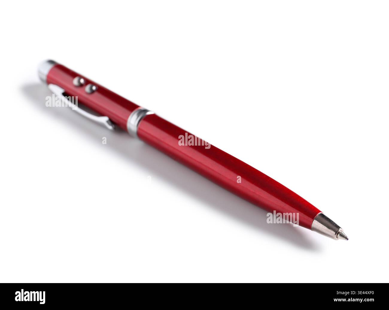 Red metallic pen on white background Stock Photo