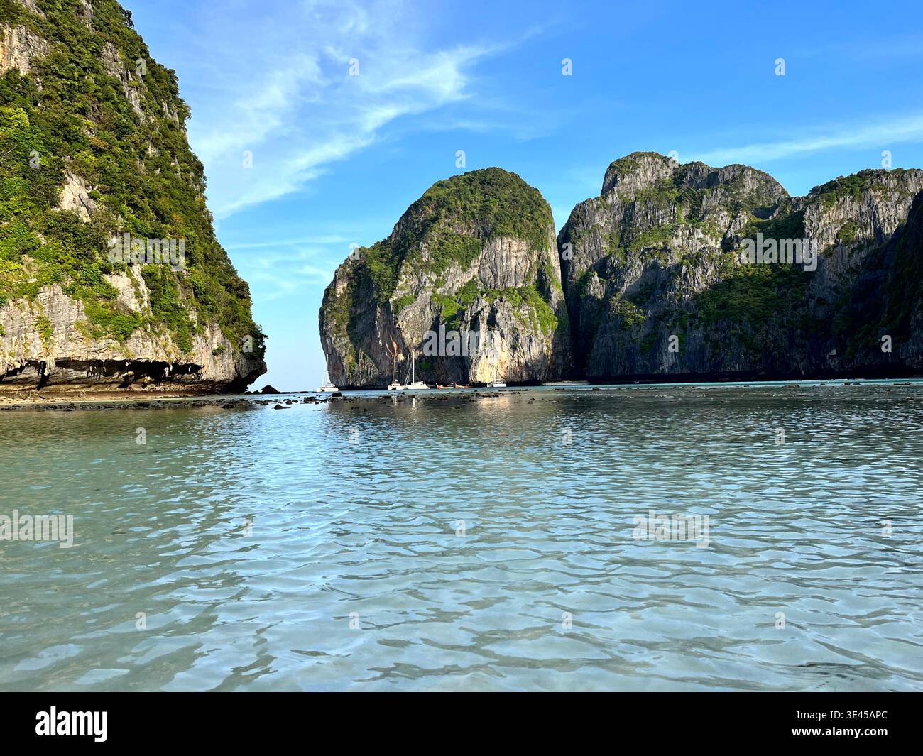 Turquoise Lagoon Enclosed by Limestone Cliffs at Maya Bay Phi Phi Islands Thailand - Smartphone Captured Stock Image