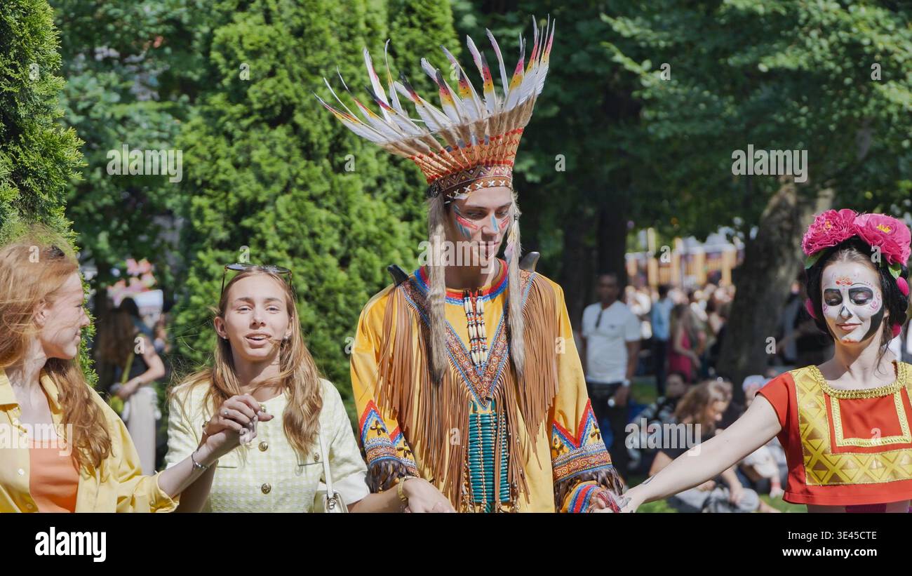 Moscow, Russia - July 5, 2025: People in costumes celebrating cultural diversity at an outdoor festival Stock Photo