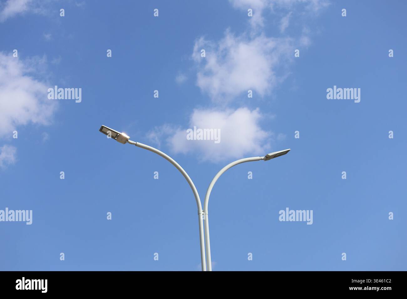 street lamp against blue sky Stock Photo