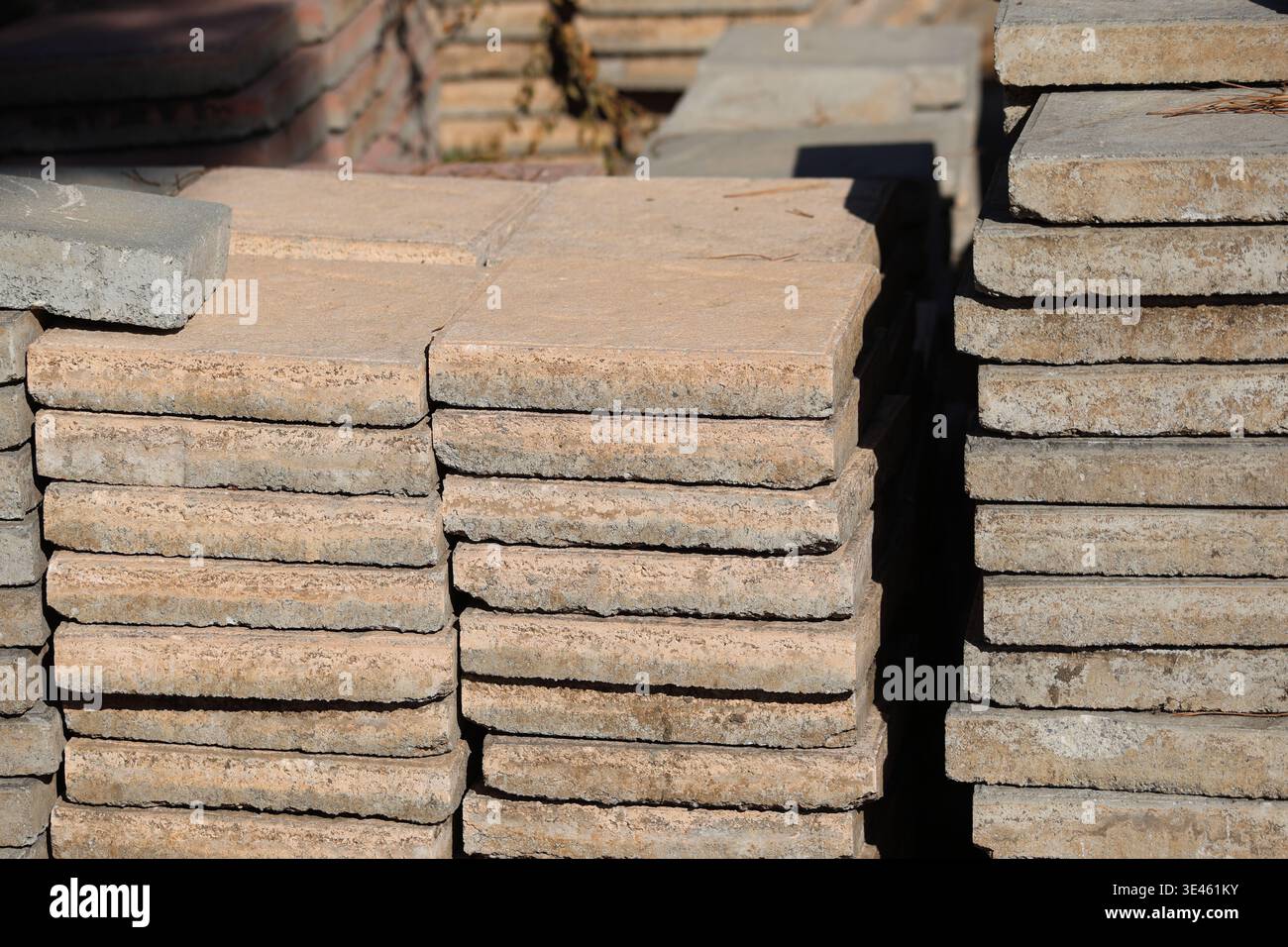 old stack of paving stones ready for reuse Stock Photo