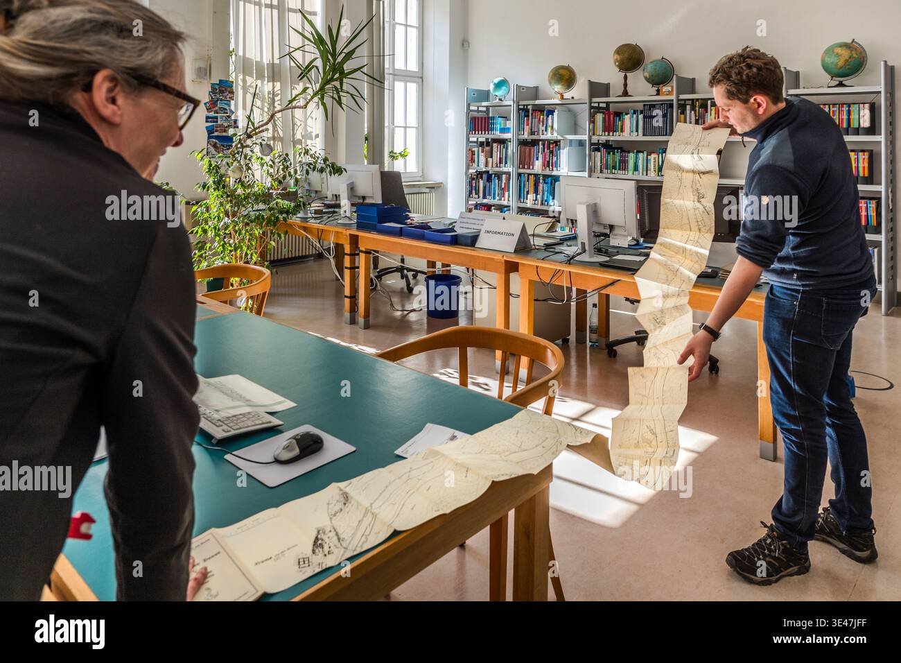 One of 285,000 maps and atlases held by the German National Library: a map of the course of the Danube, folded to follow the river’s bend. Leipzig, Saxony, Germany Stock Photo