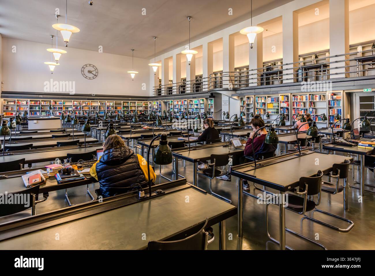 The Bauhaus reading room from 1935/36, featuring bookshelves and desks, at the German National Library in Leipzig. It houses the largest collection of Mart Stam cantilever chairs, numbering 106 pieces. Leipzig, Saxony, Germany Stock Photo