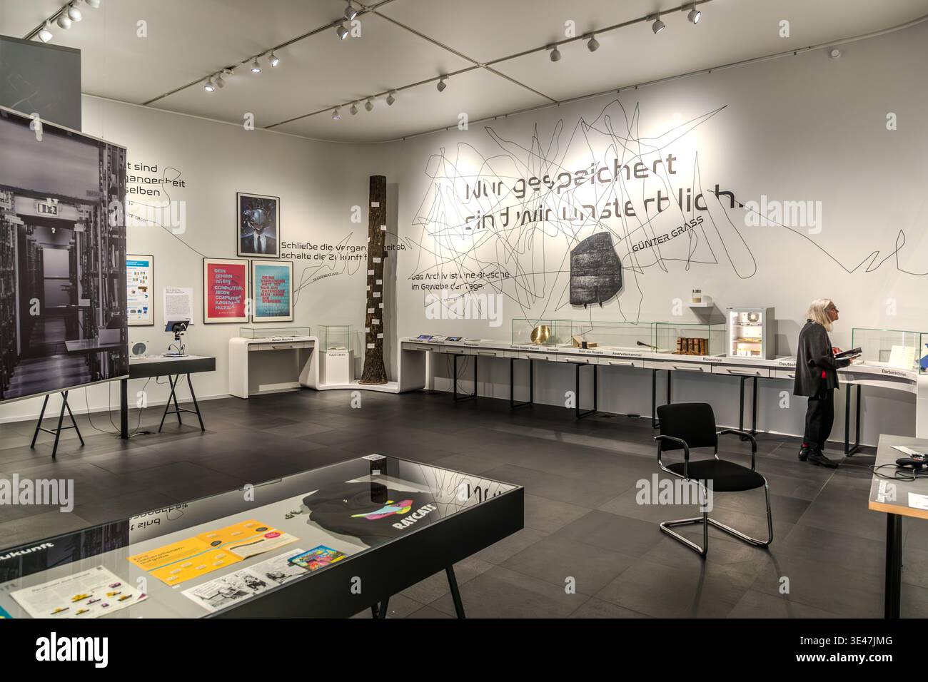 A visitor looks at exhibits in the special exhibition "forget it". German Museum of Books and Writing. Leipzig, Saxony, Germany Stock Photo