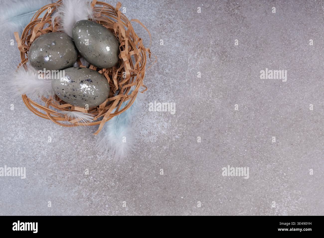 Minimal Easter greeting card eggs nest composition Stock Photo