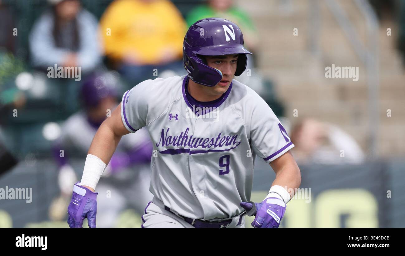 Northwestern's Nick Barron (9) runs to first base during an NCAA ...