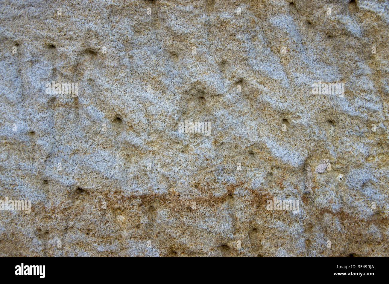 Rough sandstone surface showing natural rock texture and pattern Stock Photo