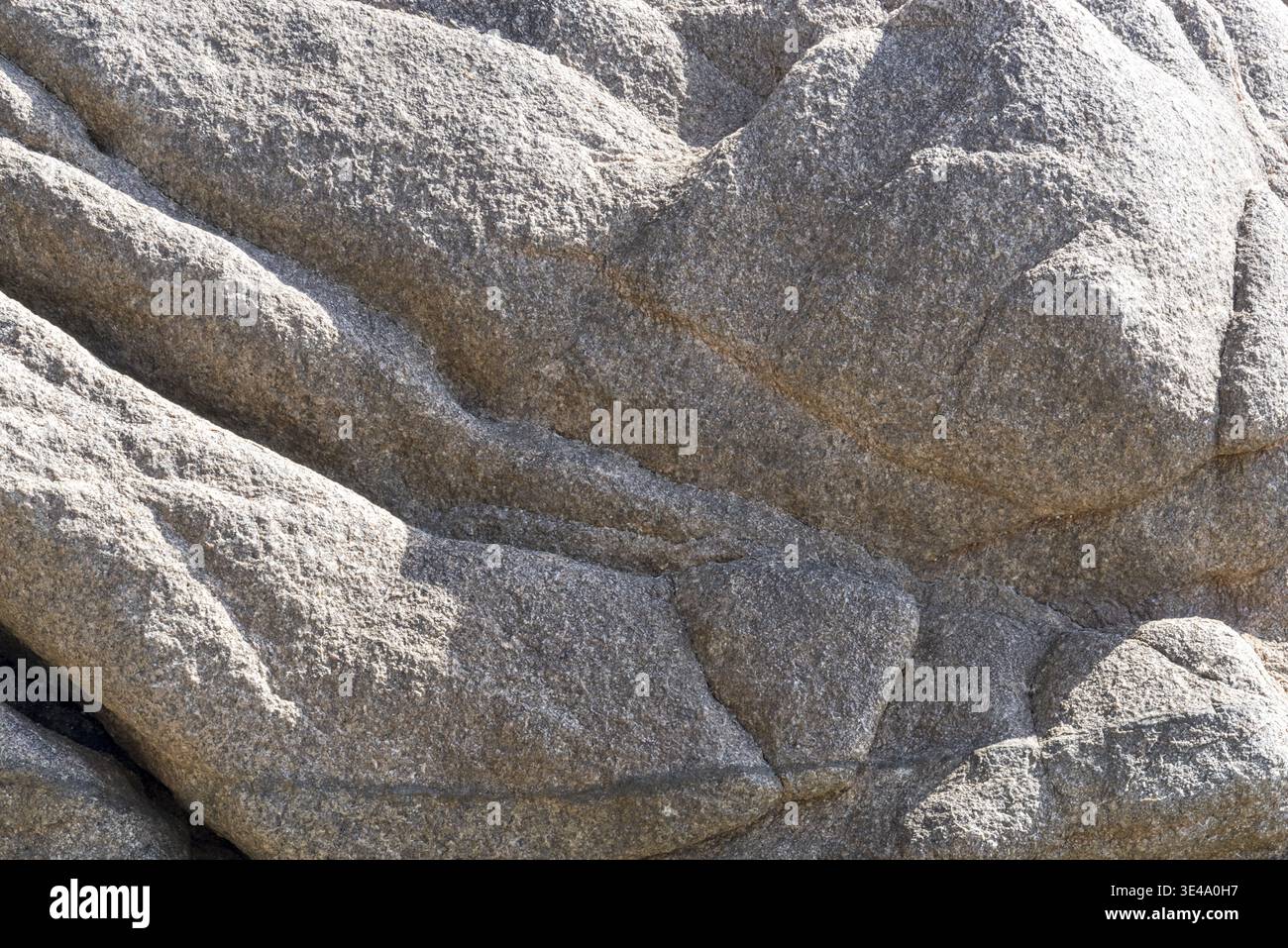 Round polished granite rocks as texture or background Stock Photo