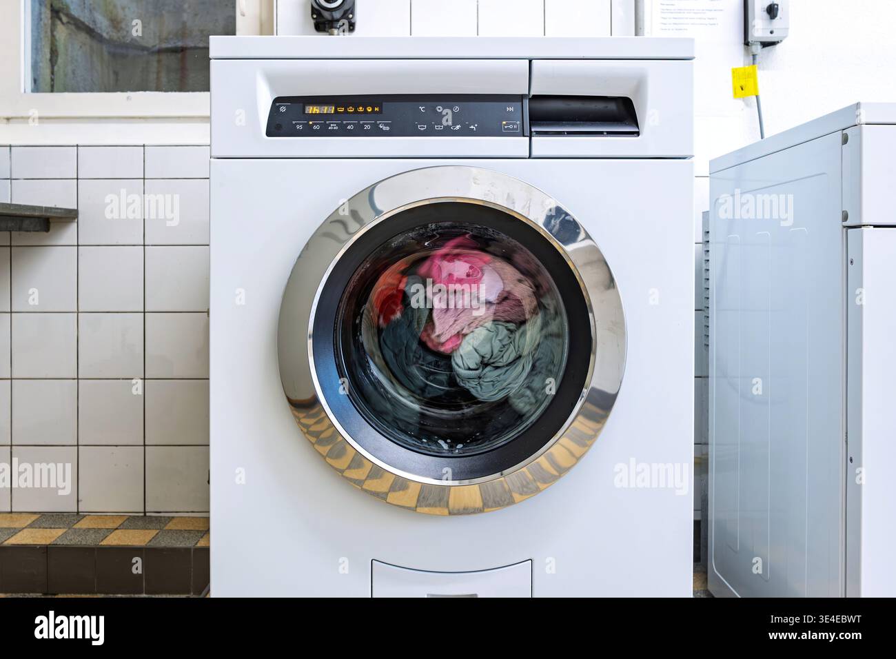 High Rise Daundry Front load washing machine hi-res stock photography and images - Alamy