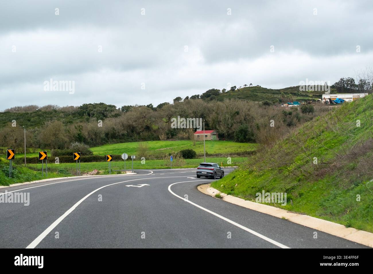 MultiLane Road Transportation with Vehicles and Cloud Cover Stock Photo