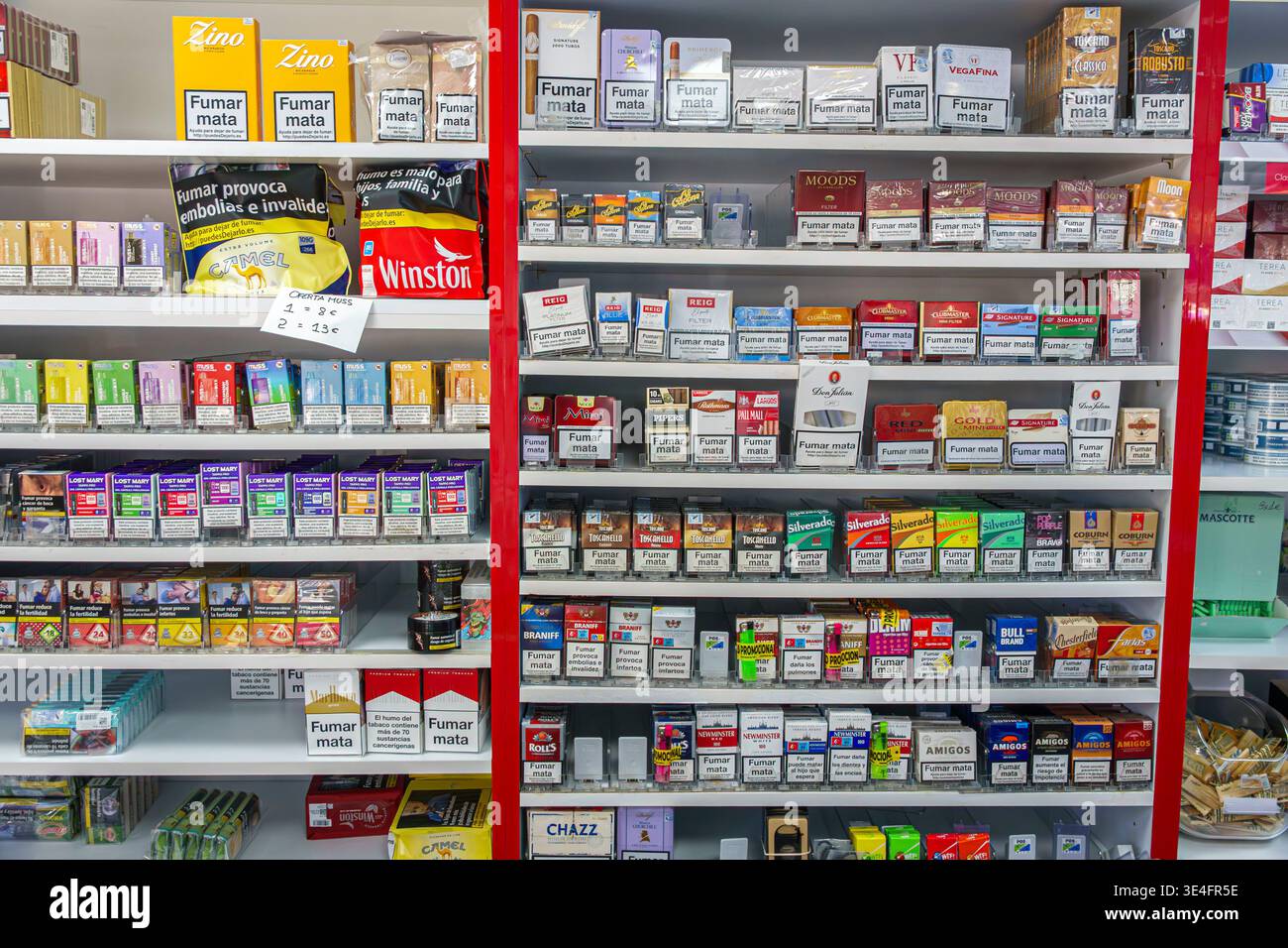 tobacco benalmadena Malaga Spain,Andalusia,tobacco shop cigarette display,store shelves stocked  packs,retail business interior,consumer goods sales,product variety assort  Stock Photo
