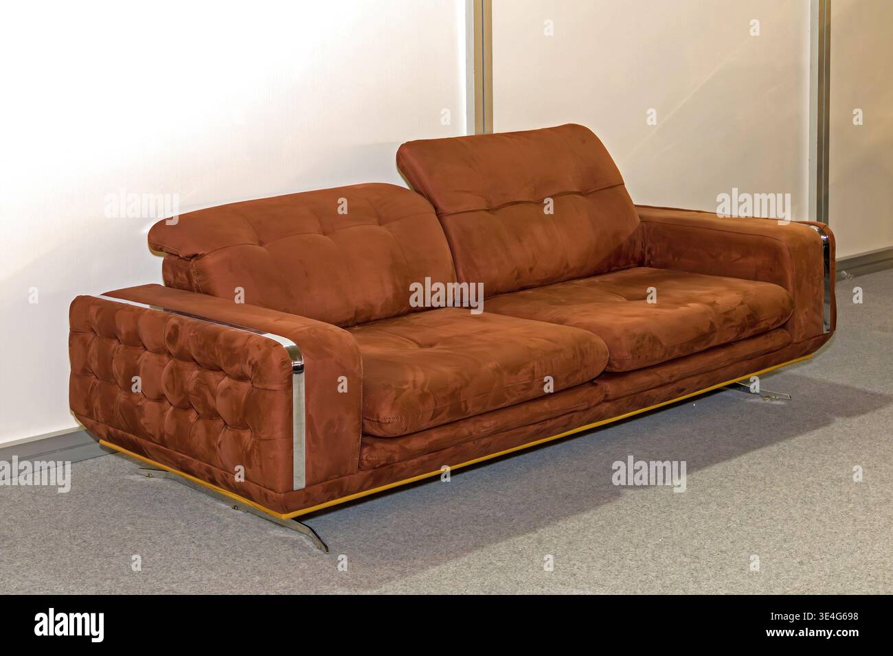 Brown leather upholstery material couch inside empty room interior Stock Photo