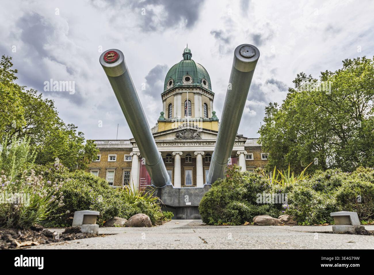 Front view of the Imperial War Museum in London, with twin naval guns ...
