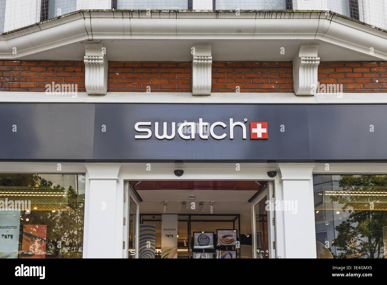 Swatch store in London with iconic signage, Swiss watch brand ...