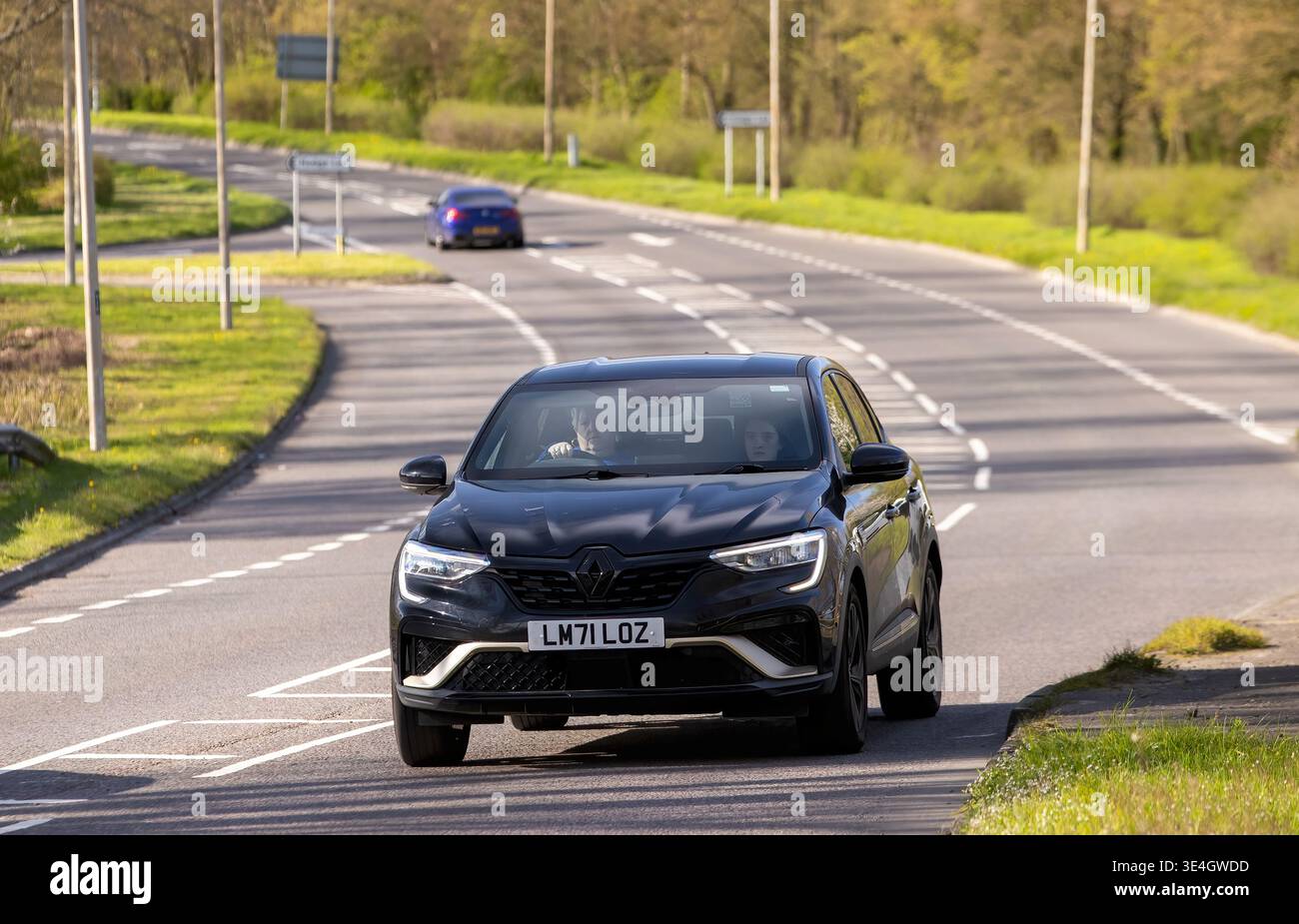 Milton Keynes,Bucks,UK - Mar 26th 2026:   2023 Renault Arkana hybrid electric car driving on a British road Stock Photo