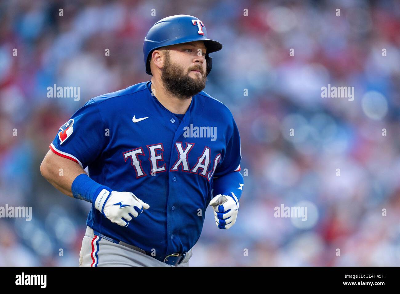Texas Rangers' Jake Burger hits a two-run home run during the ninth ...