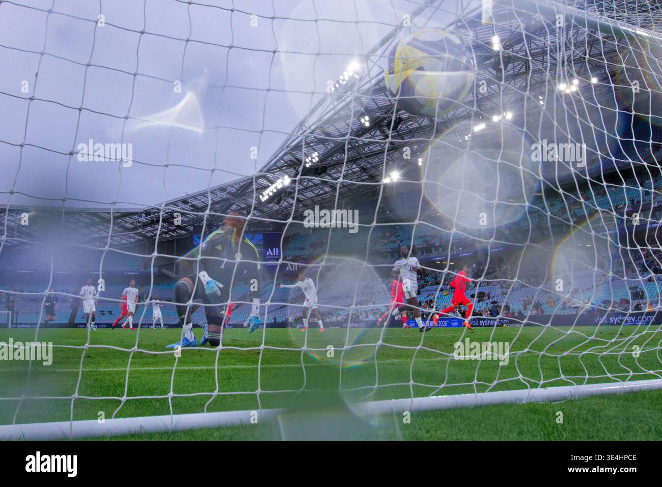 Goalkeeper Eloy Room Of Cura ao Looks On In The Rain As The Ball Hits goalkeeper-eloy-room-of-cura-ao-looks-on-in-the-rain-as-the-ball-hits