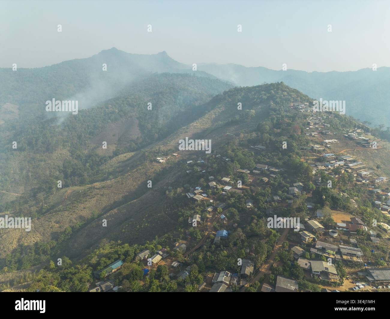 Alarming summer wildfire smoke covering mountain village Thailand ...
