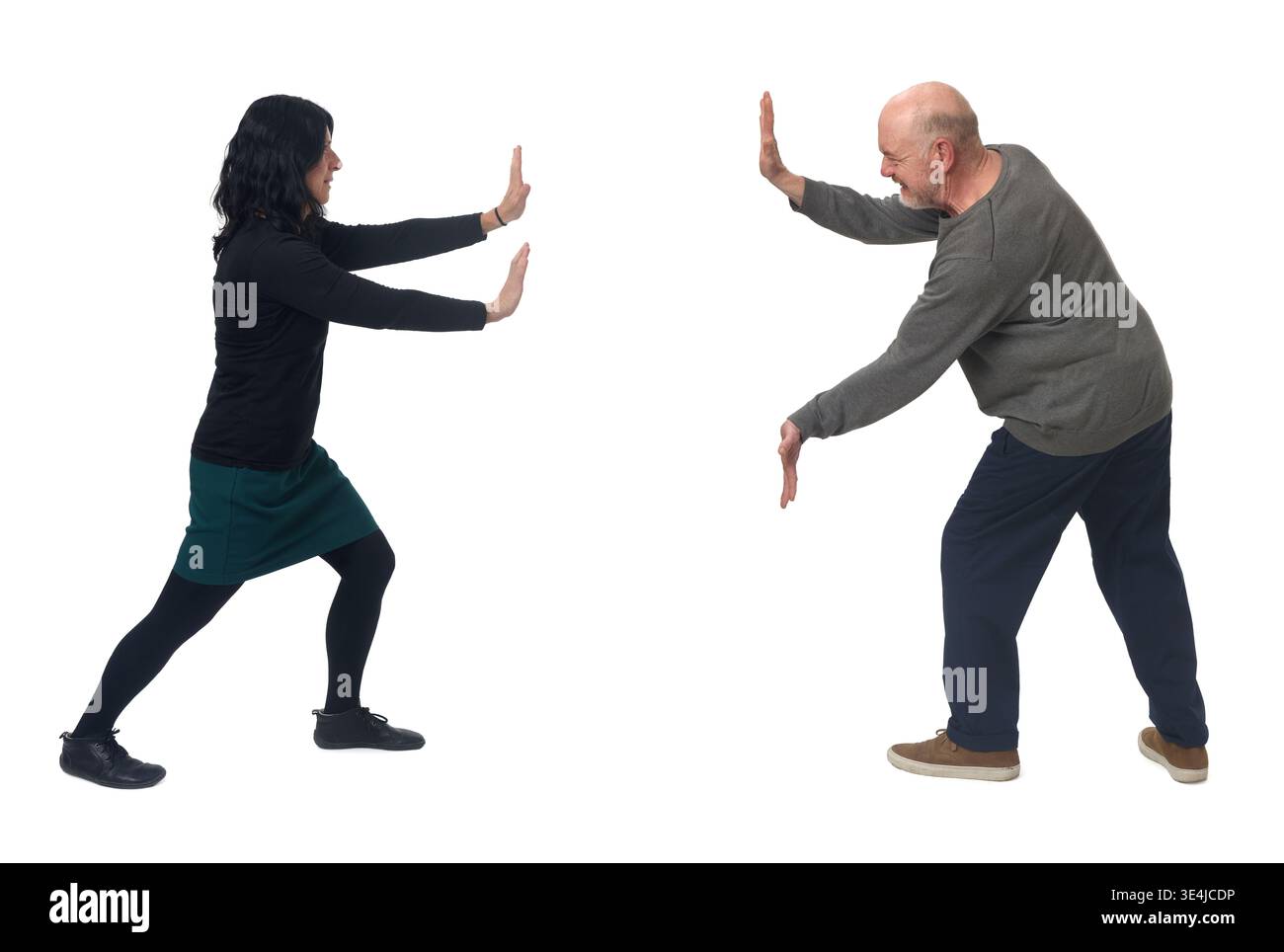 couple pressing something imaginary against each other Stock Photo