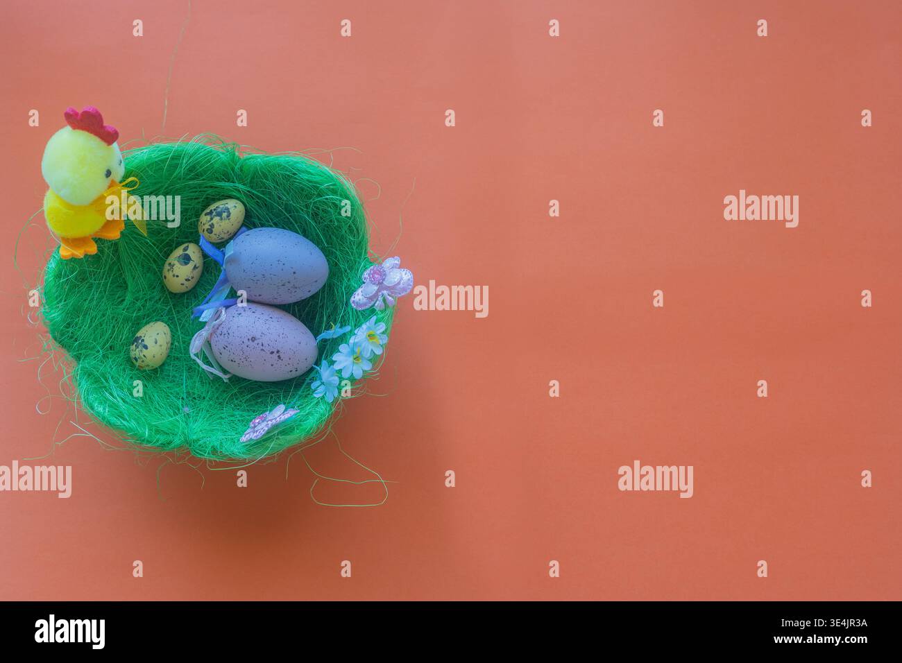 Image for Easter banners or cards on a red background. Place for text. Stock Photo