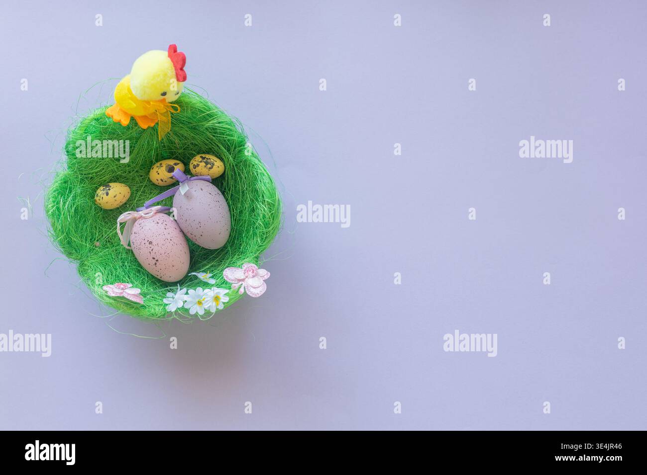 Image for Easter banners or cards on a purple background. Place for text. Stock Photo