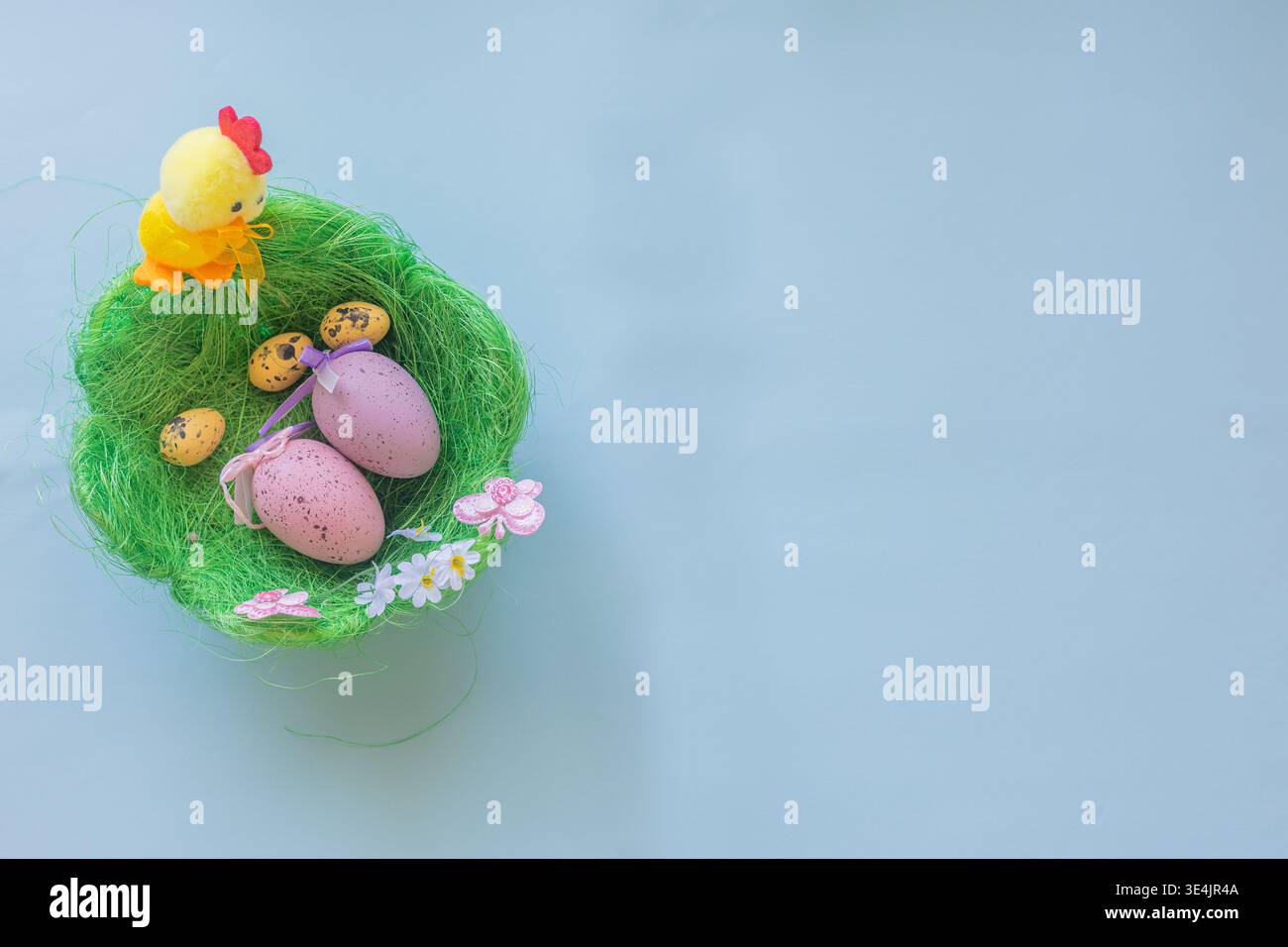 Image for Easter banners or cards on a blue background. Place for text. Stock Photo