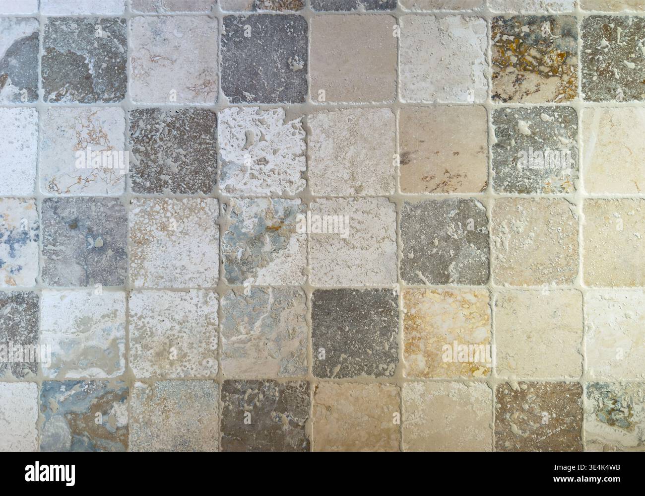 Old stone tiles pattern aged wall texture gray natural background Stock Photo