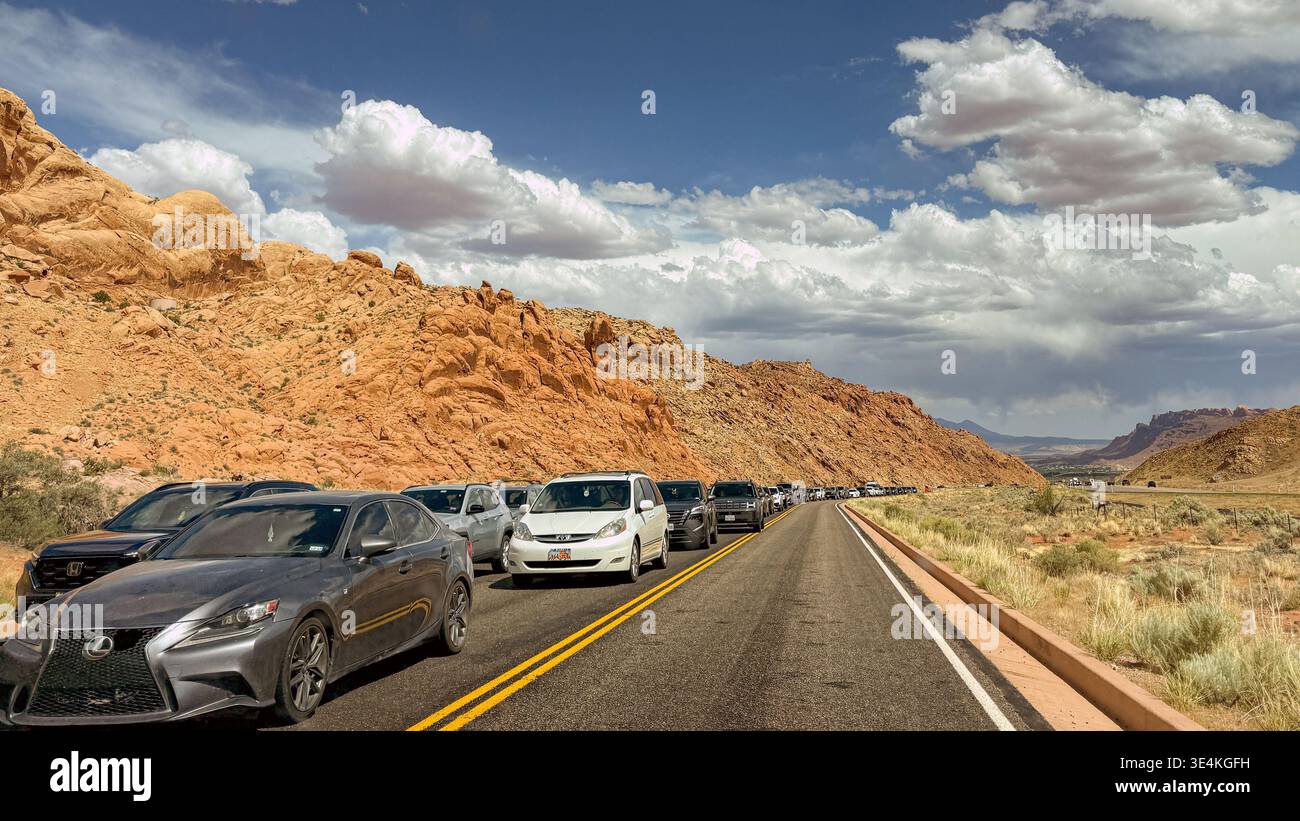 Moab, Utah, USA - 25 May 2025: Cars queuing to enter the Arches National Park. - Smartphone Captured Stock Image