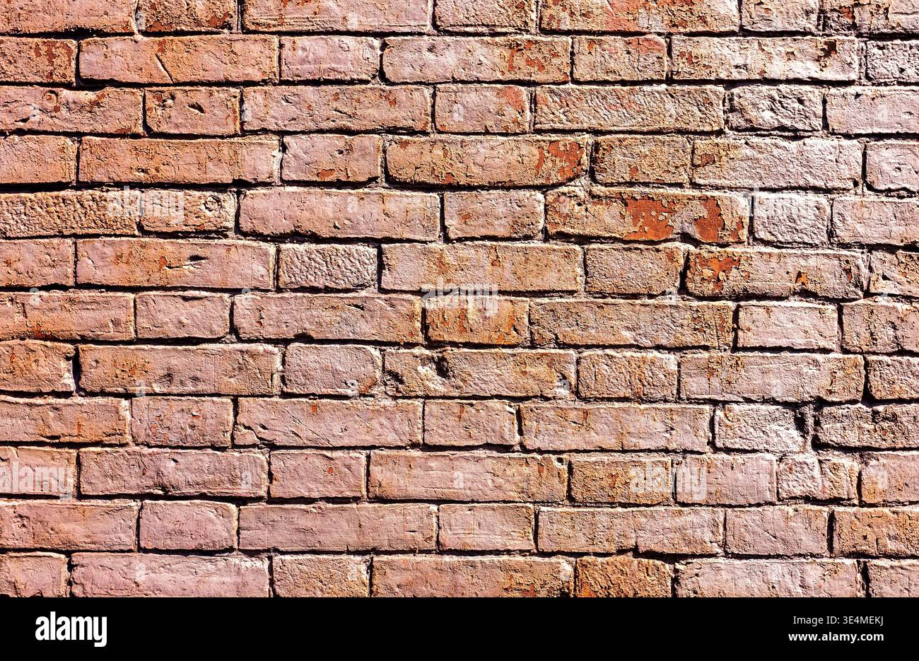 Old weathered red brick wall as creative background, close up Stock Photo