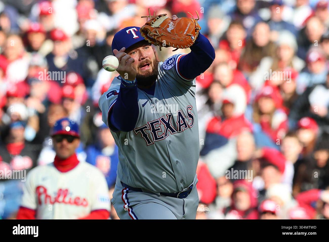 PHILADELPHIA, PA - MARCH 28: Jake Burger #21 of the Texas Rangers drops ...