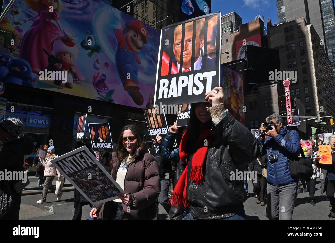 Thousands march down Times Square in Manhattan for the third â€˜No ...