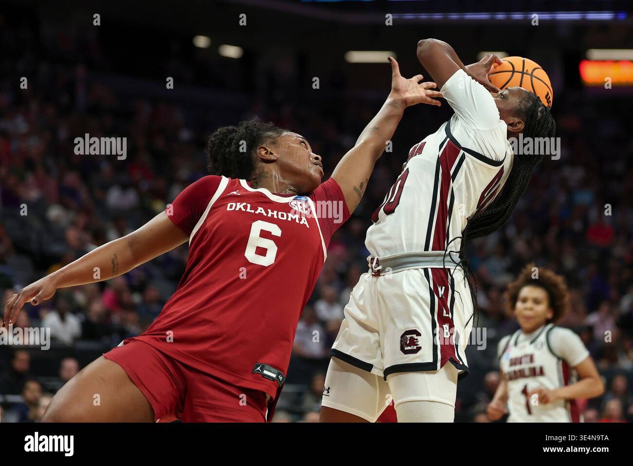 South Carolina guard Ta'niya Latson (00) shoots over Oklahoma forward ...
