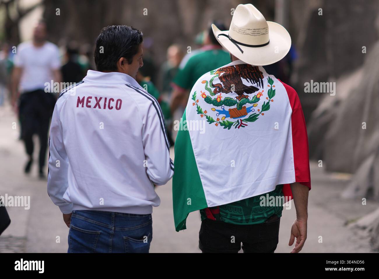 Fans arrive to the Azteca Stadium ahead of the international friendly ...